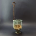 Ancient Roman Glass Beakerfound with a bronze ladle stuck inside